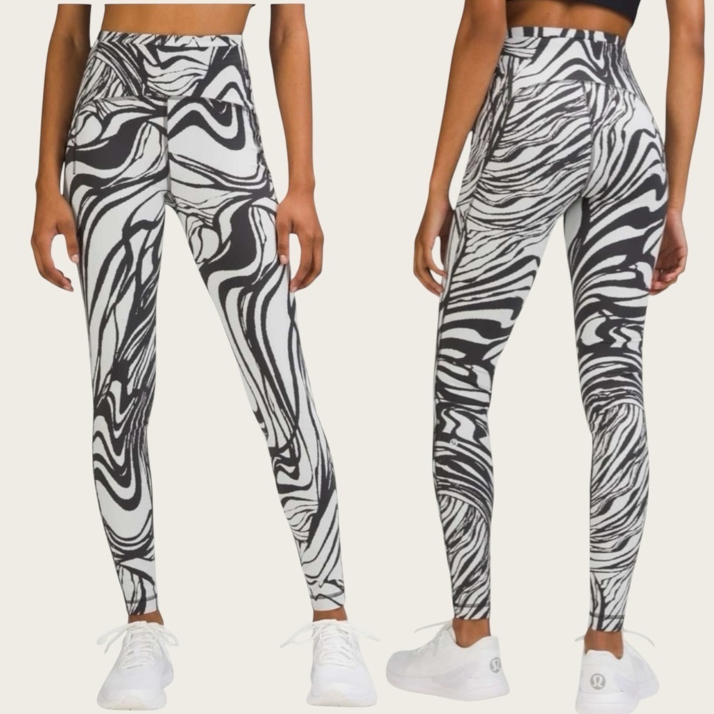 Lululemon Swift Speed High-Rise Tight 28"
Graphite Grey Size 0 NEW